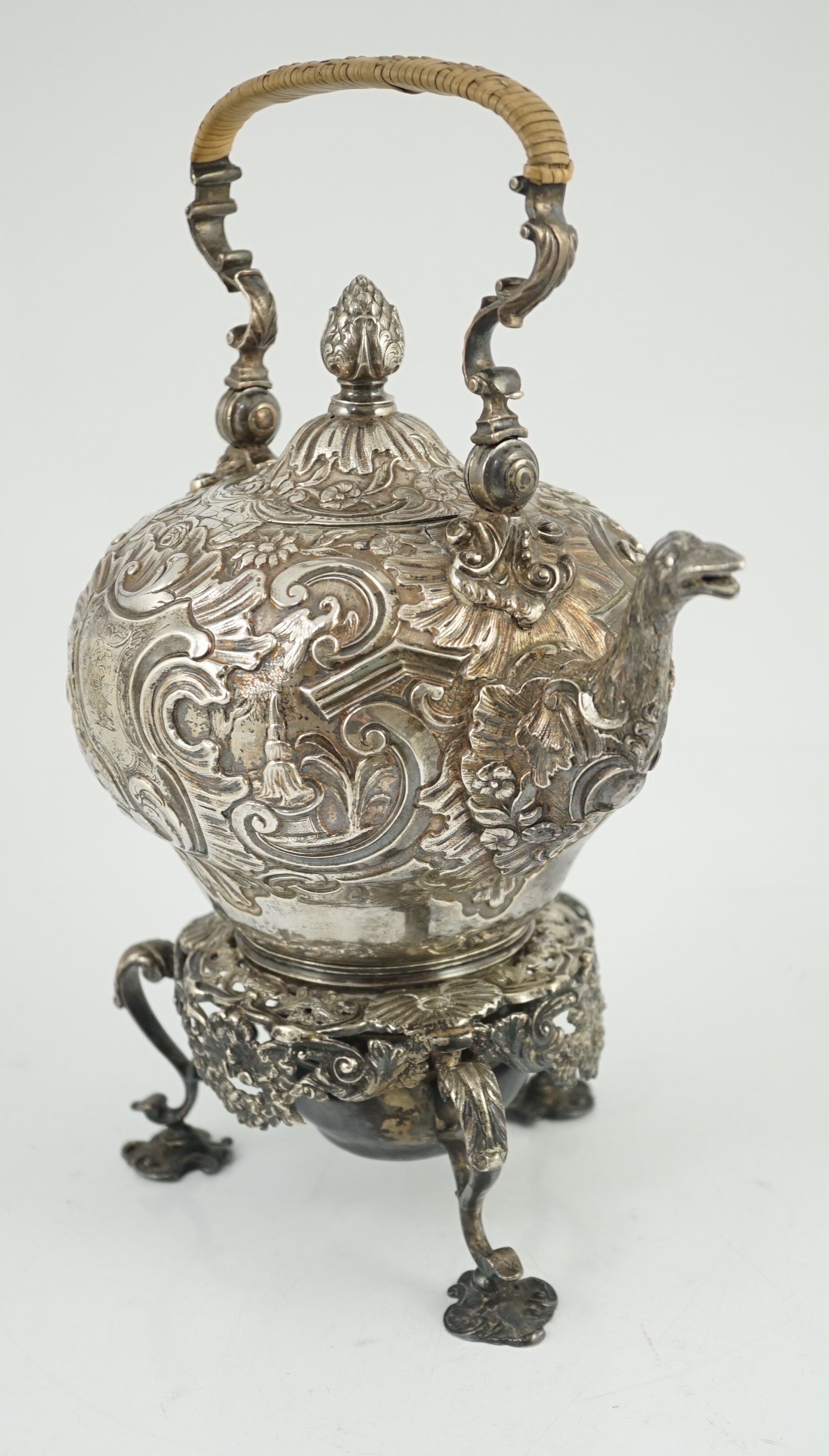 A George II embossed silver tea kettle on stand, with burner, by Francis Crump